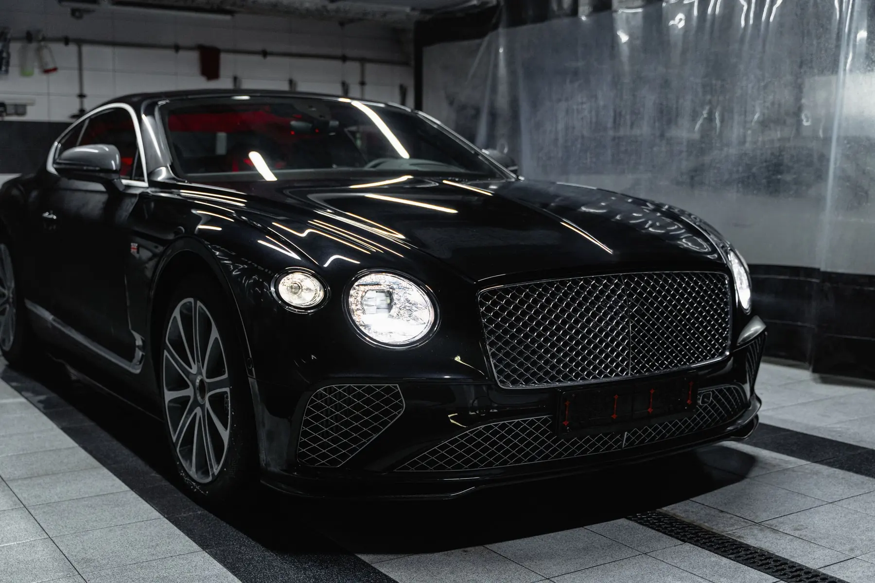 Black luxury car in the studio