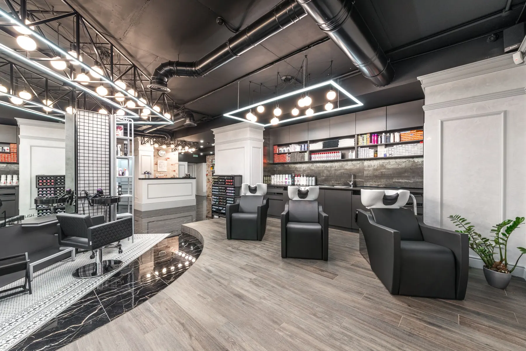 Modern barbershop floor with styling stations