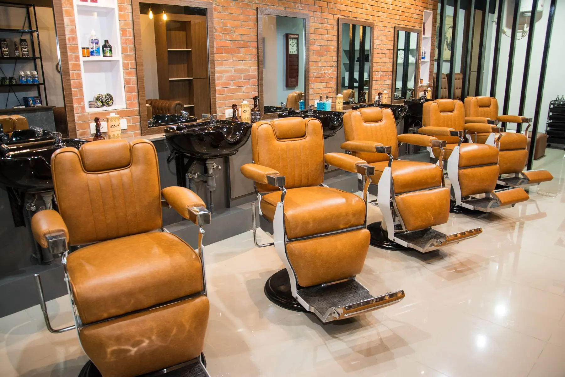 Row of leather barber chairs