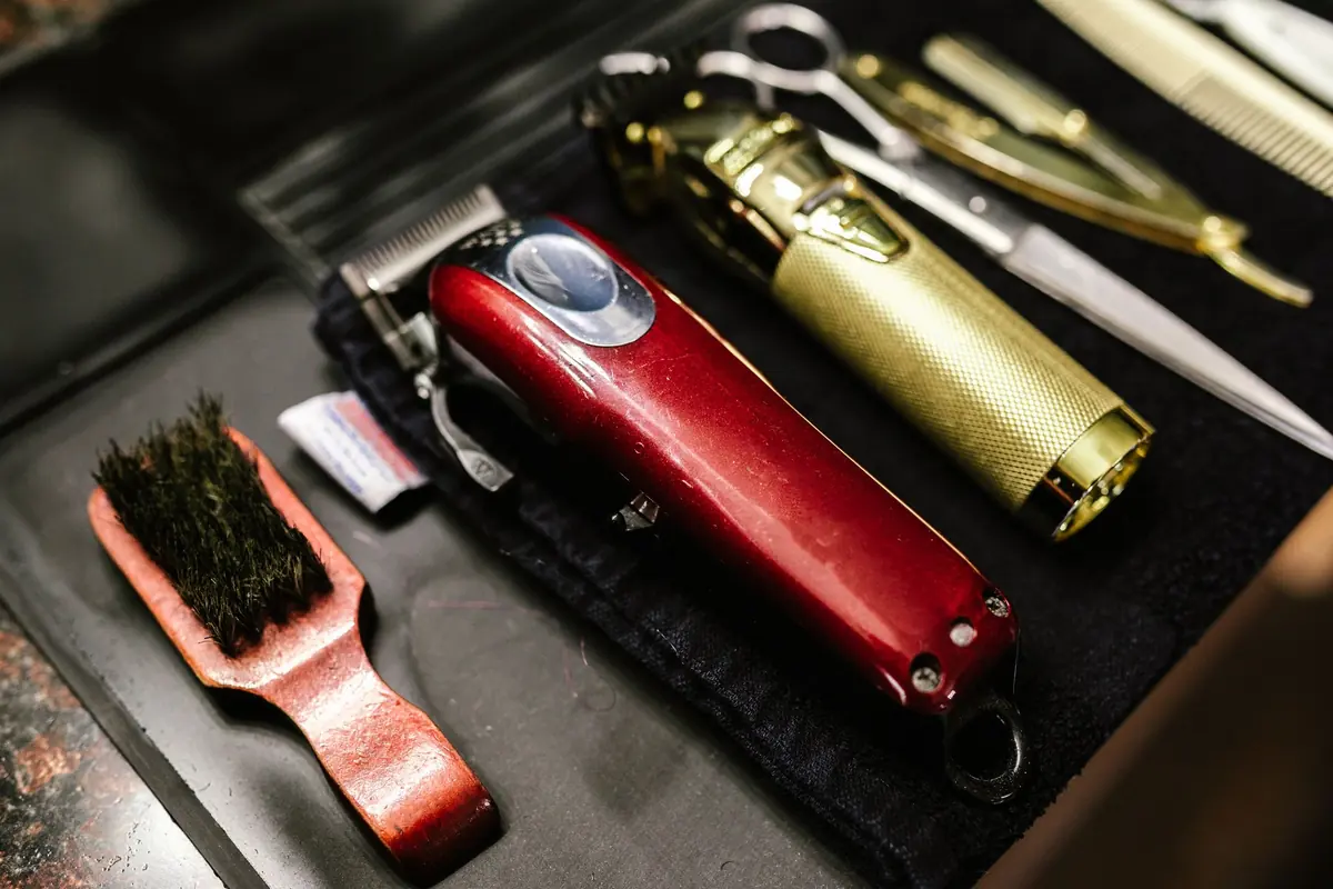 Barber tools on a black mat
