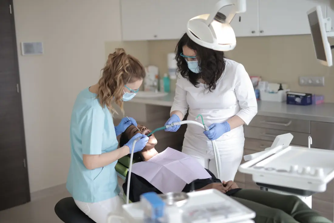 Dentist with patient