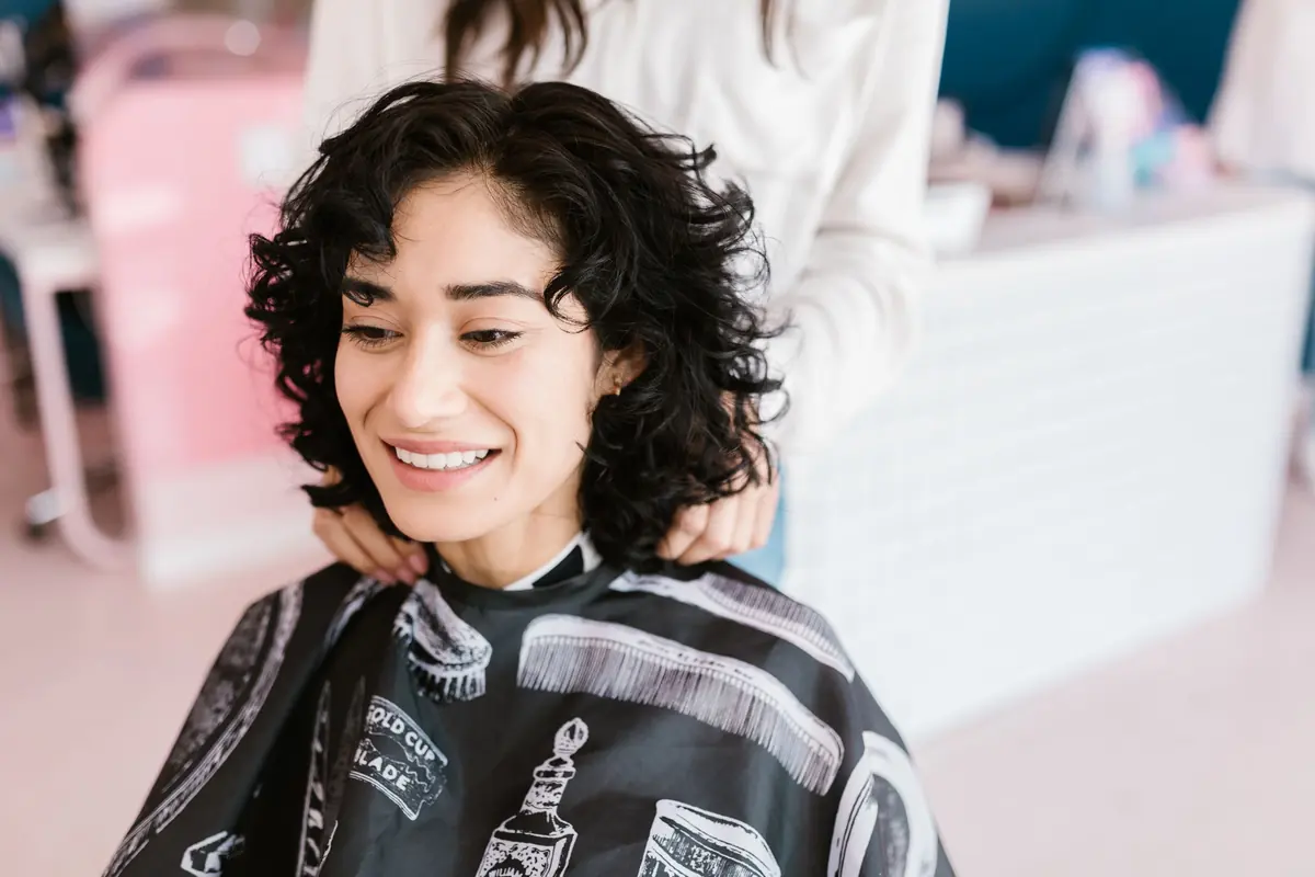 Happy client with fresh curls