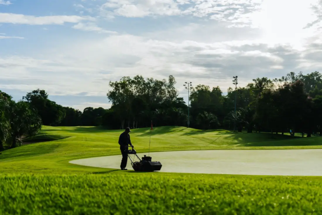 Mowing a wide green lawn